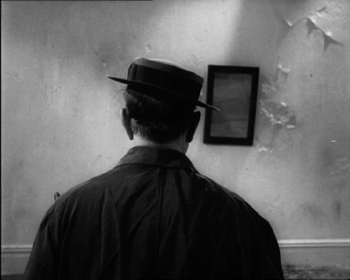 Buster Keaton op de rug gefilmd in Becketts 'Film' (1964).
